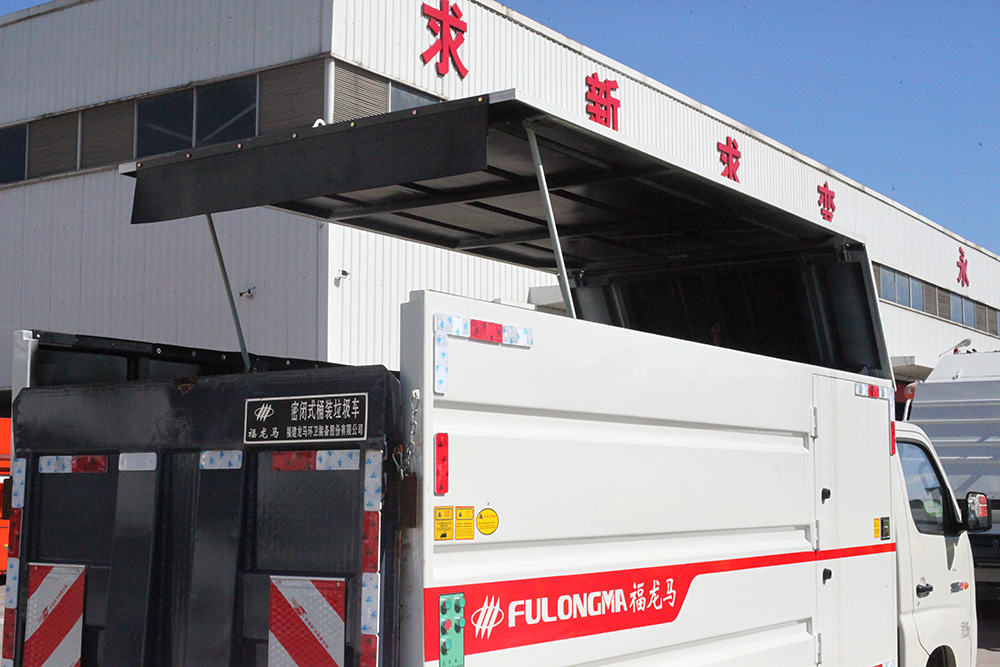 Camion de transfert de poubelle