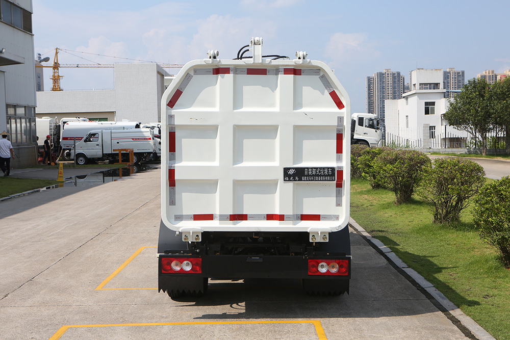 camión de basura con cubo colgante