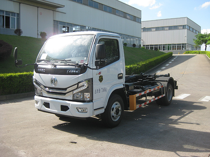 Hook Lift Trucks vs. Roll-Off Trucks: Which One Is Right for Your Business?
