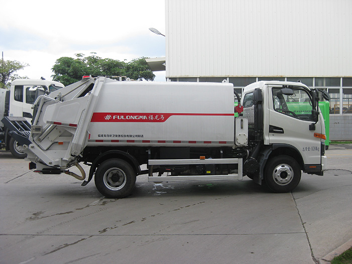 Explore the design and functionality of the rear end of a garbage truck