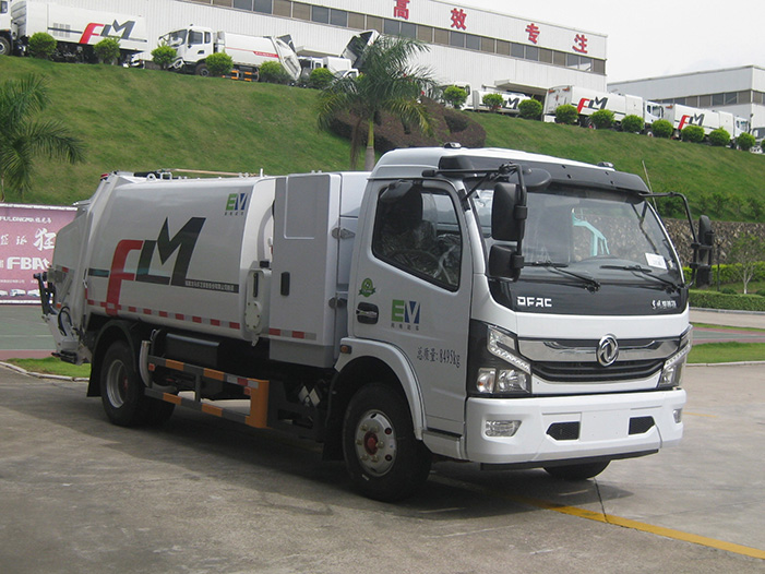 Electric garbage compactor truck designed for municipal waste collection and transport
